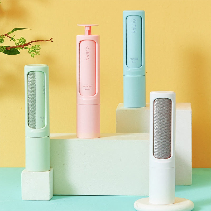 Reusable pet hair brushes shown in four colors; this listing includes one blue brush only